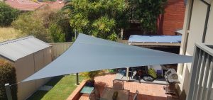 Shade Sails over paved outdoor patio area