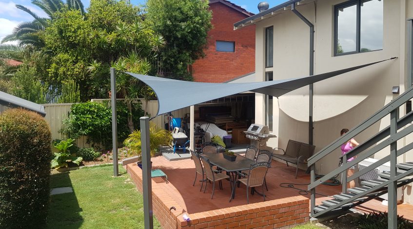 Shade Sails over an Outdoor Patio Area